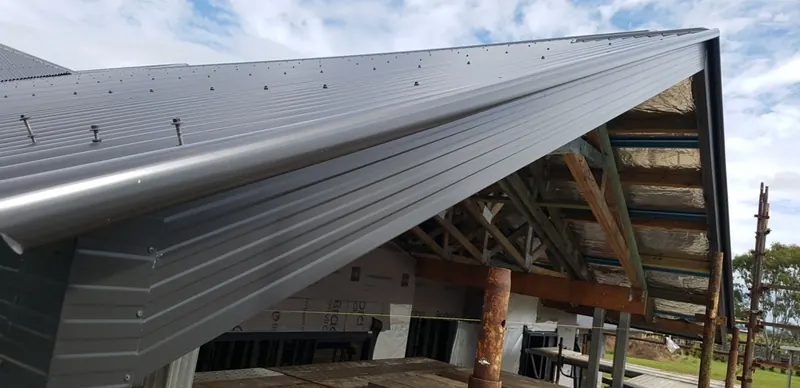 New ridge capping on a restored roof
