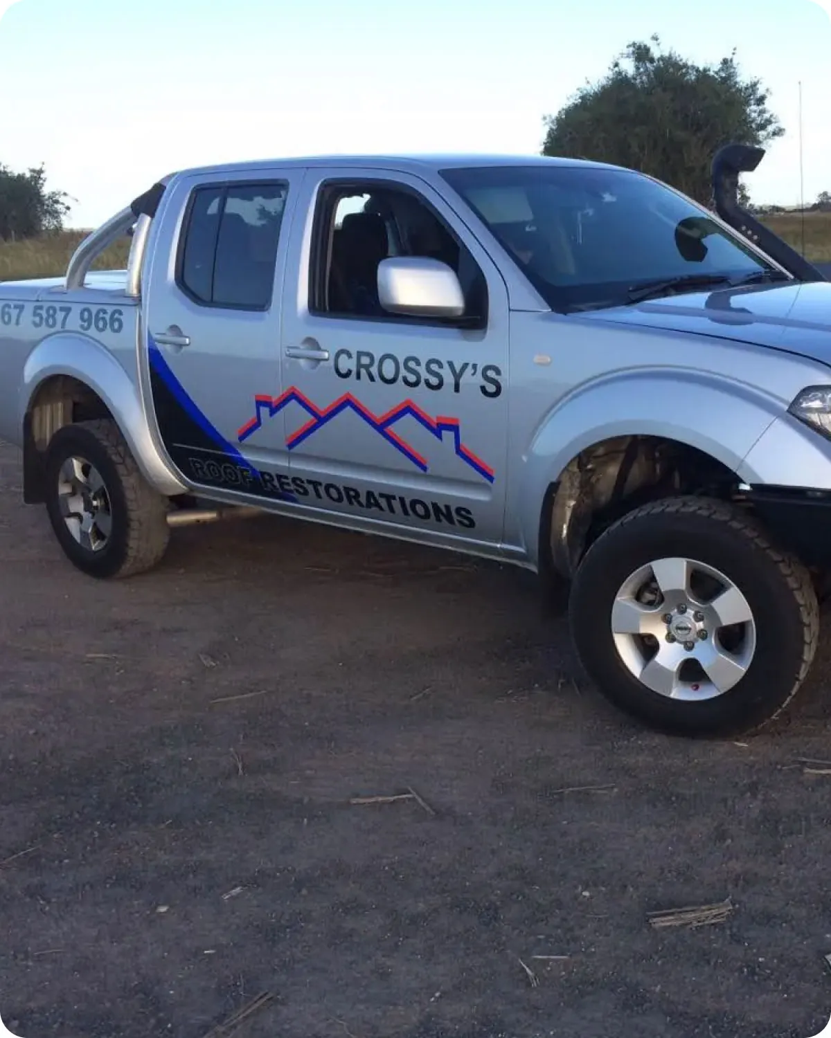 Crossy's branded truck on a roofing job in Byron Bay